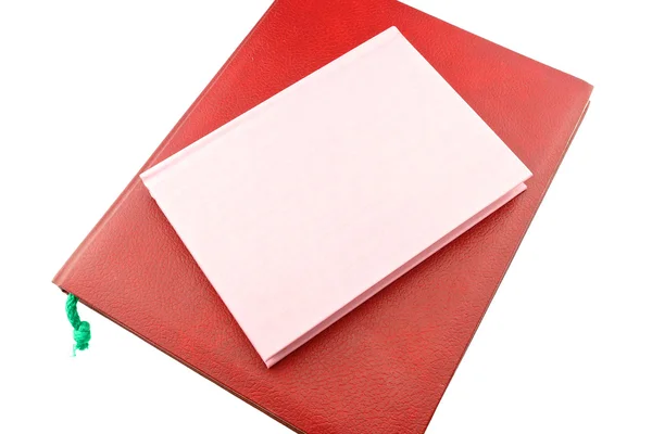 Cuaderno rojo y rosa apilado aislado —  Fotos de Stock