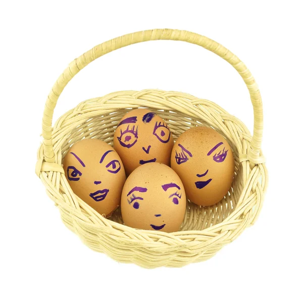 Happy and fun emoticons eggshell in basket isolated — Stock Photo, Image