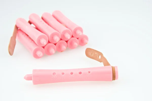 Close up pink plastic curler for hairstyle — Stock Photo, Image