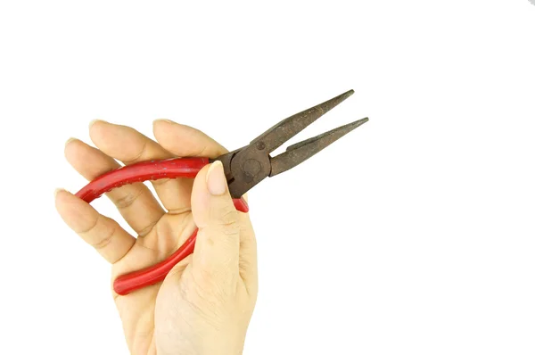 Homem segurando um velho alicate vermelho para reparo isolado — Fotografia de Stock