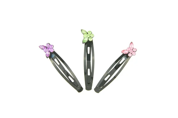 Black hair clip with colorful butterfly put as fork isolated — Stock Photo, Image