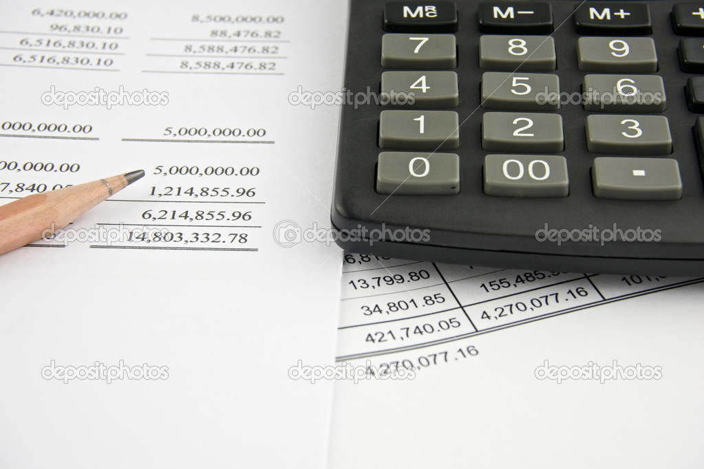 Balance sheet with pencil and black calculator