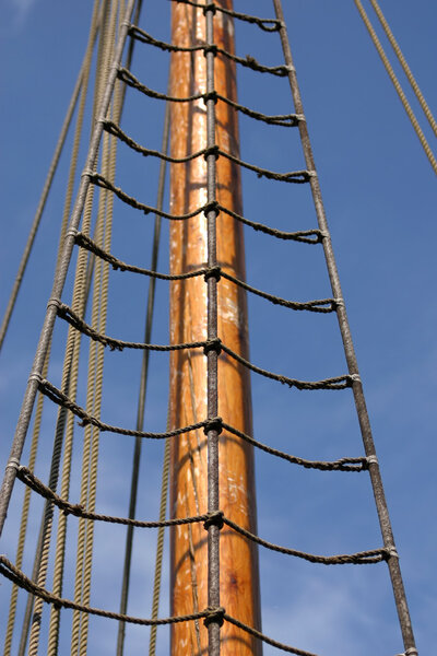 Masts and rigging against a blue sky
