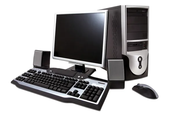 Computer desktop con monitor LCD, tastiera, altoparlante e mouse , Immagine Stock