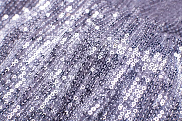 Ruhadarabok, ezüst flitter. Glitter háttér. Flös textúra — Stock Fotó