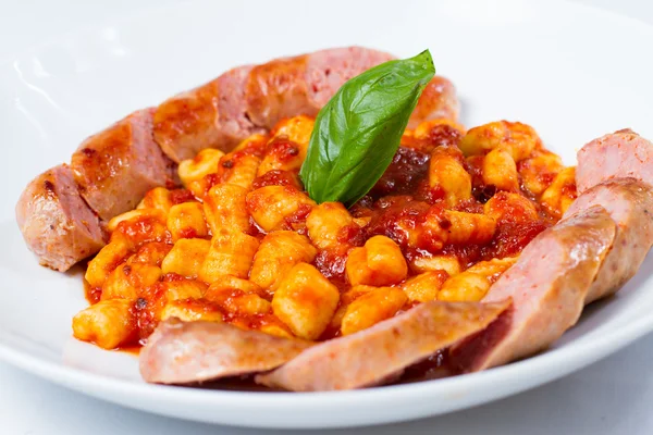 Nhoque com linguiça de porco italiana fresca — Fotografia de Stock