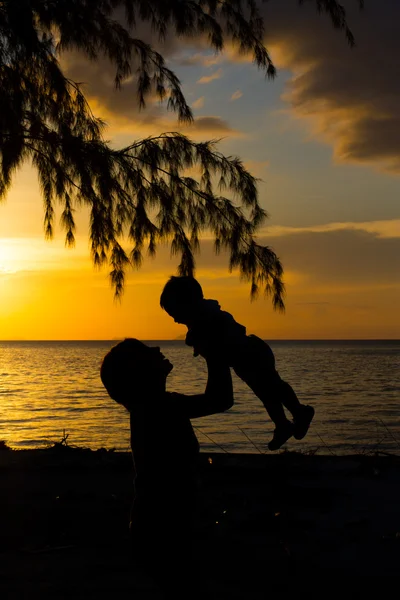 Mother and little son silhouettes — Stock Photo, Image