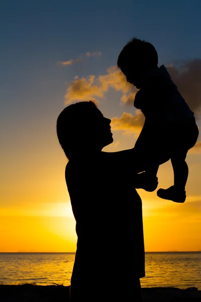 Mother and little son silhouettes — Stock Photo, Image