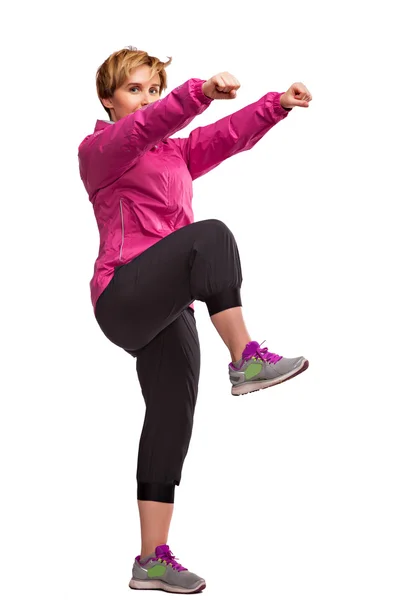 Sports girl exercise on a white background — Stock Photo, Image