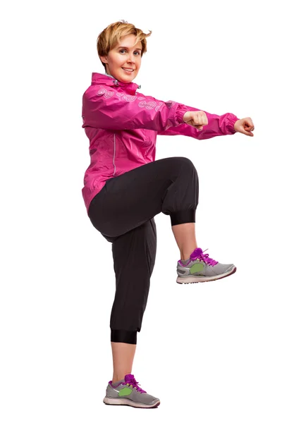 Kız beyaz bir arka plan üzerinde egzersiz spor — Stok fotoğraf