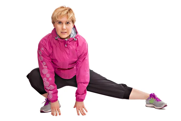 Mulher fitness bonita fazendo exercício de alongamento, isolado — Fotografia de Stock