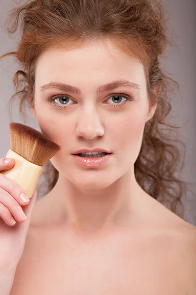 Applying Makeup, red hair girl with perfect skin — Stock Photo, Image