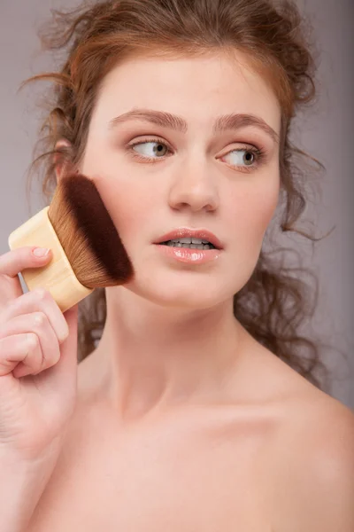 Applying Makeup, red hair girl with perfect skin — Stock Photo, Image