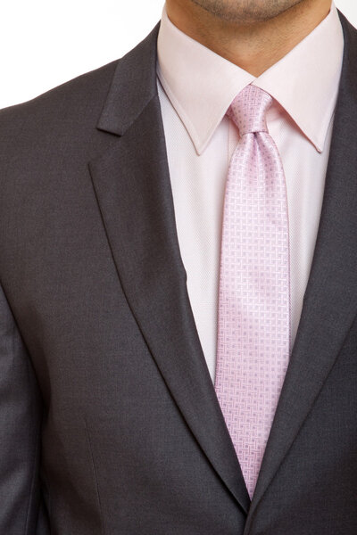 Black suit with pink tie