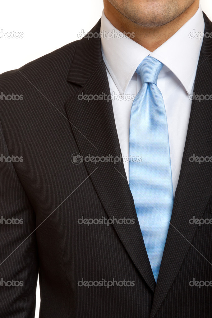 Grey suit with blue tie