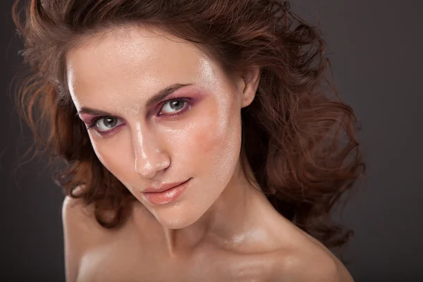 Sexy brunette woman with wet face — Stock Photo, Image