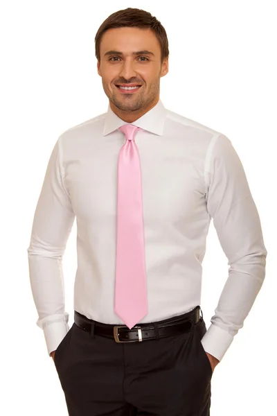 Bărbat bine îmbrăcat în costum şi cravată. Omul de afaceri carismatic în picioare pe fundal alb — Fotografie, imagine de stoc