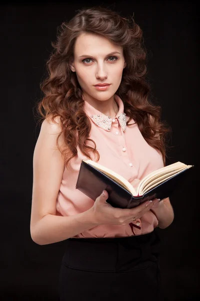 Businesswoman with book — Stock Photo, Image