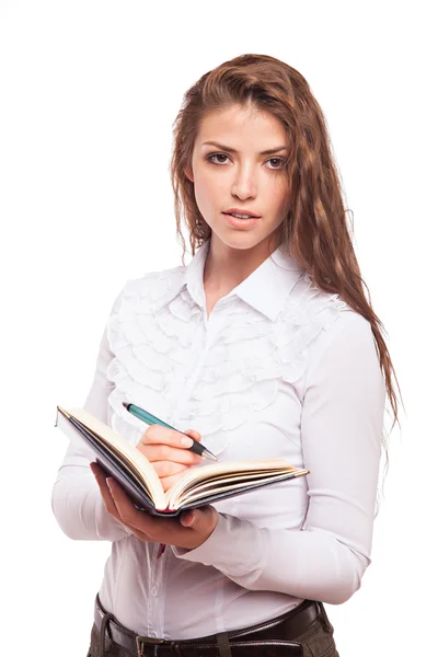 Businesswoman with notepad and pen — Stock Photo, Image