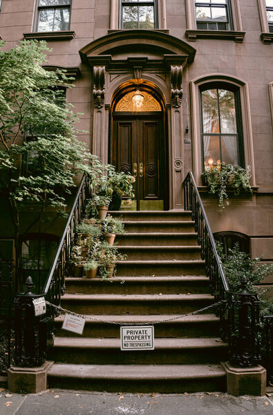 Typical facades of New York City. Brown brick houses in NYC, USA