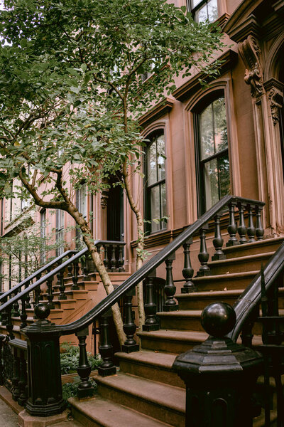 Typical facades of New York City. Brown brick houses in NYC, USA