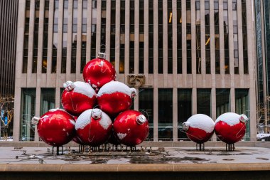 New York City landmark, Giant Christmas Ornaments near Radio City Music Hall in Rockefeller Center in Midtown Manhattan NYC
