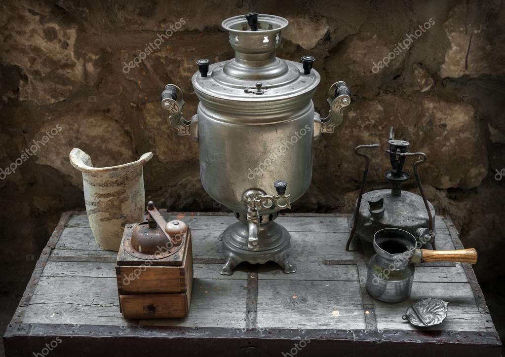 Old Samovar Coffee Grinder Oil Lamp Maker Stock Photo Old Samovar Coffee Grinder Oil Lamp Maker On A Table Photo By Kaluginsergey