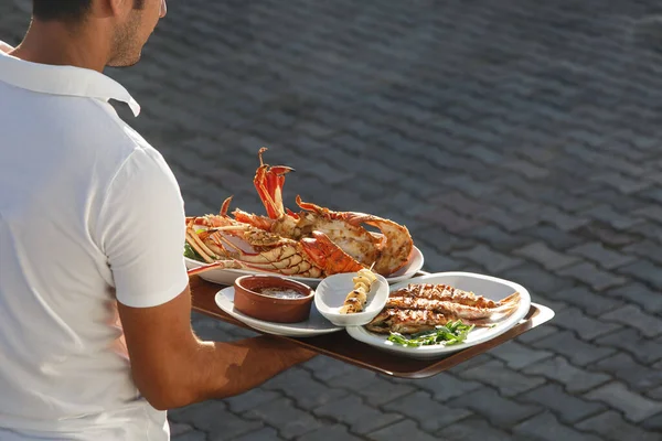 Waiter Serving Sea Foods Restaurant — Stock Photo, Image