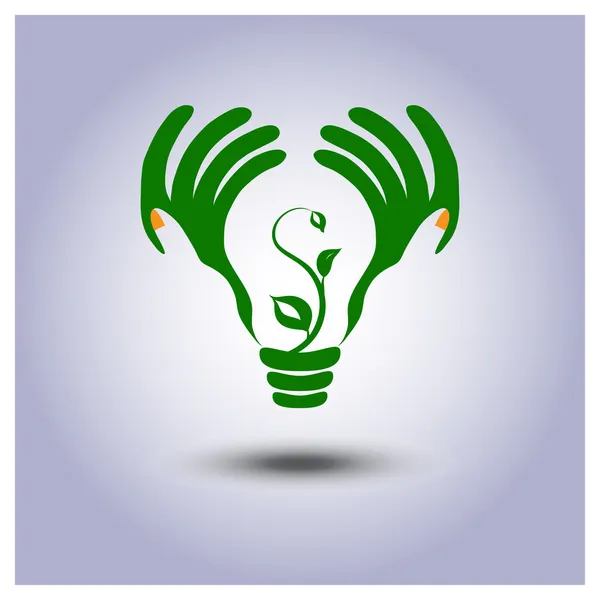 Groene ecologie gloeilamp pictogram in handen — Stockvector