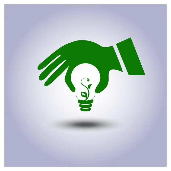 Zelená ikona žárovky ekologie v ruce — Stockový vektor