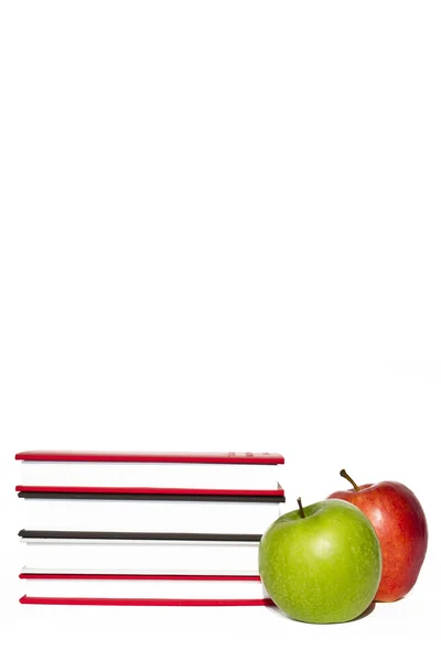 Books and apple isolated on white background — Stock Photo, Image