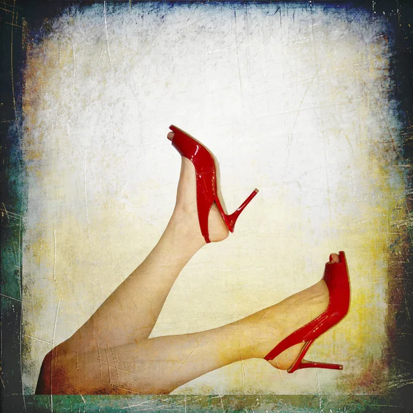 Perfect female legs wearing high heels — Stock Photo, Image