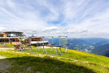 PLAN DE CORONES 2019, July 22: A beautiful view of Kronplatz (Plan de Corones) with mountain range in background, Italy