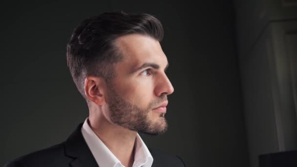 Serious Young Elegant Business Man Posing Dark Office Window Closeup — Wideo stockowe