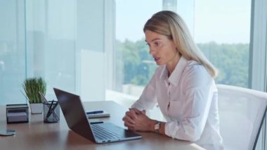 Business Woman Coach Blogger having video Call Recording Live Video talking to the Camera. Confident Business woman making Distance Conference Online Chat sitting at Office. Webcam View. Technology