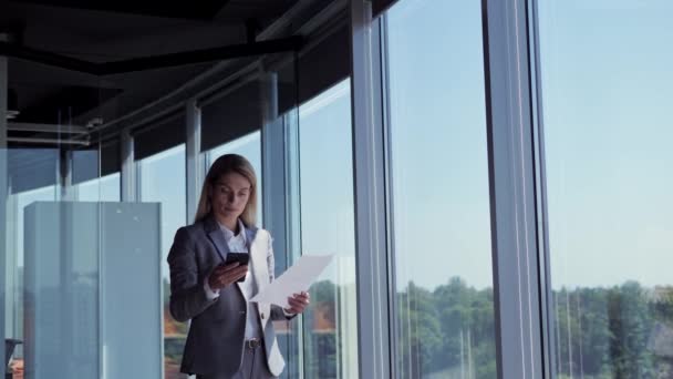 Successful Confident Business Woman Using Smartphone Holding Document Standing Panoramic — Video Stock