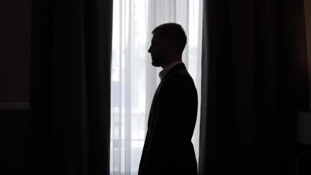 Portrait Thoughtful Businessman Silhouette Business Man Standing Window Folding Hands — Stock video