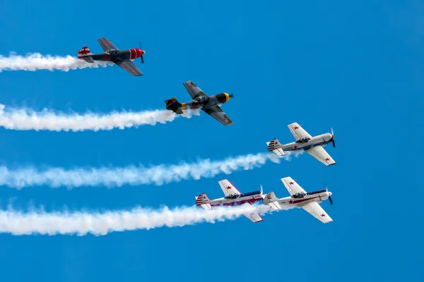 Aerostars Yak 52 50 aerial display at Biggin Hill Airshow — Stock Photo, Image