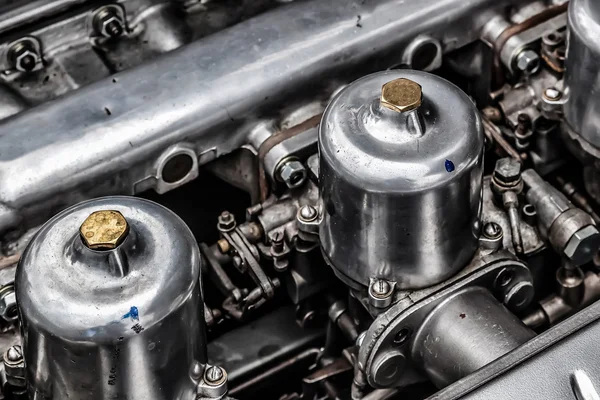 Carburettors under the bonnet of an old Jaguar sports car — Stock Photo, Image
