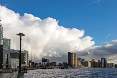 Winter storm approaching Docklands London clipart