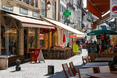 A typical colourful street scene in Boulogne France clipart