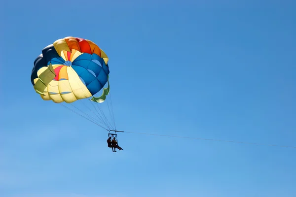 Two people paragliding off a beach in Gran Canaria — Stock Photo, Image