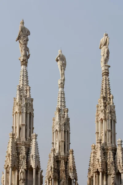 Close-up view of some spires and statues of the Duomo Cathedral — Stock Photo, Image