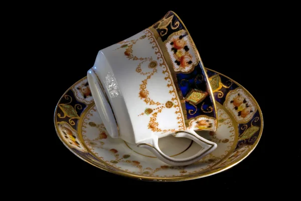 Ancienne tasse en porcelaine et soucoupe en os — Photo