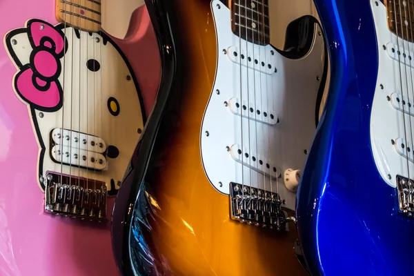 Electric guitars on display in a music shop — Stock Photo, Image