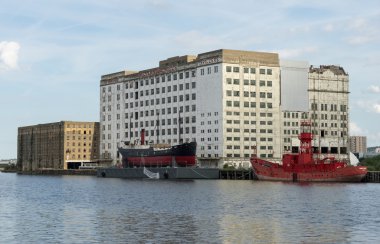 SS Robin and Trinity lightship next to the Millennium Mills in S clipart