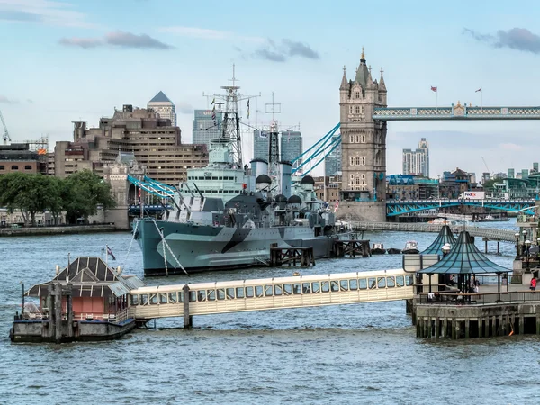 HMS Belfast anchored near Tower Bridge in London — Stock Photo, Image