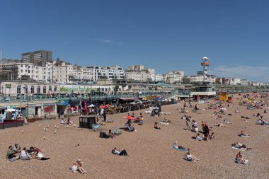 Brighton, East Sussex, UK - July 15, 2022 : View of the beach in Brighton on July 15, 2022. Unidentified people