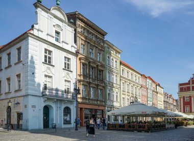 Poznan, Poland - September 16, 2014 : Cafes in the main square of Poznan on September 16, 2014. Unidentified people
