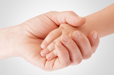 Holding çocuğun el anne